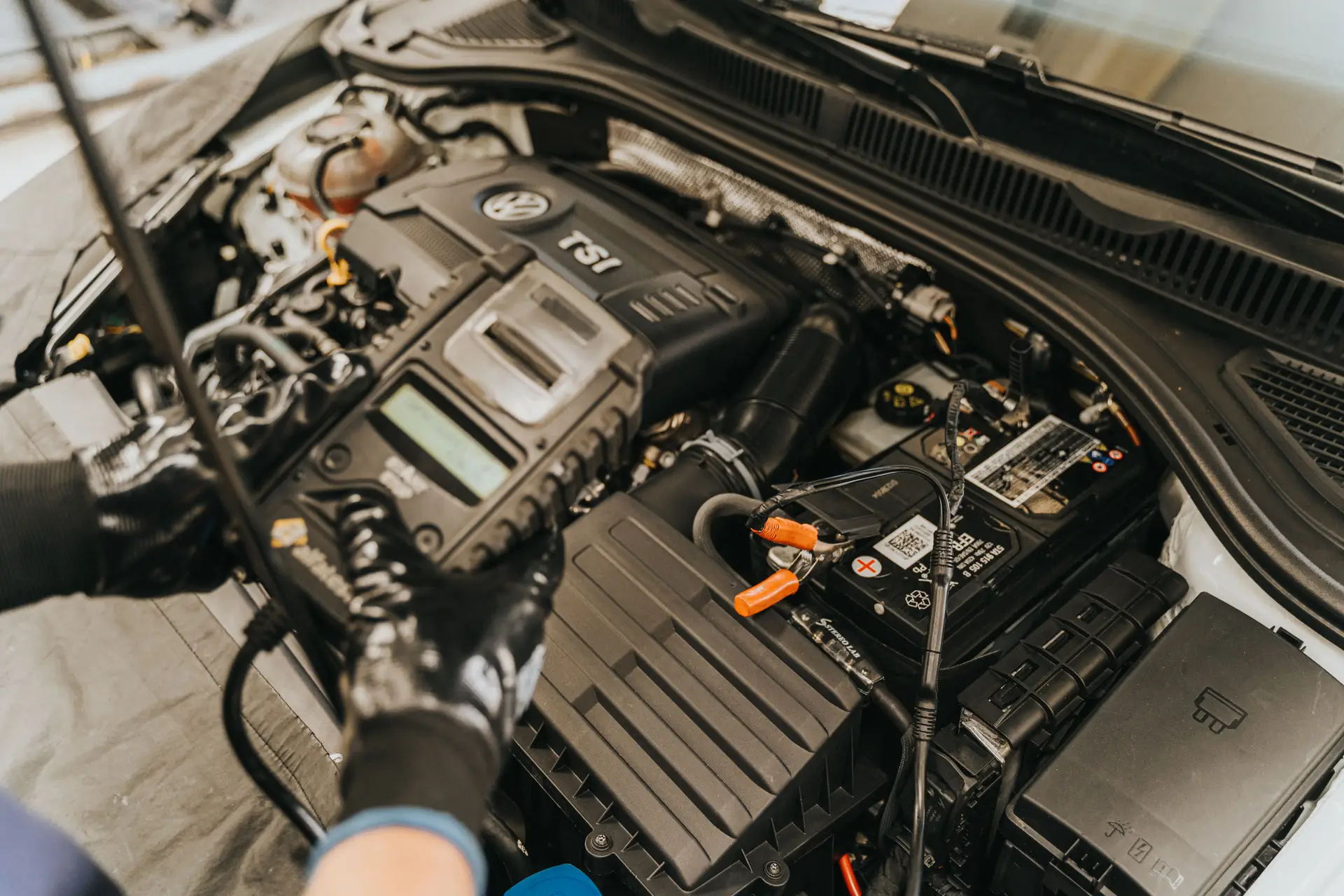 Professional automotive workshop with diagnostic equipment